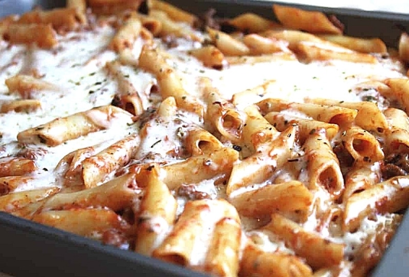 Half tin of baked ziti with marinara sauce and cheese from Ronzio's, served with garlic bread at Kidz Kastle