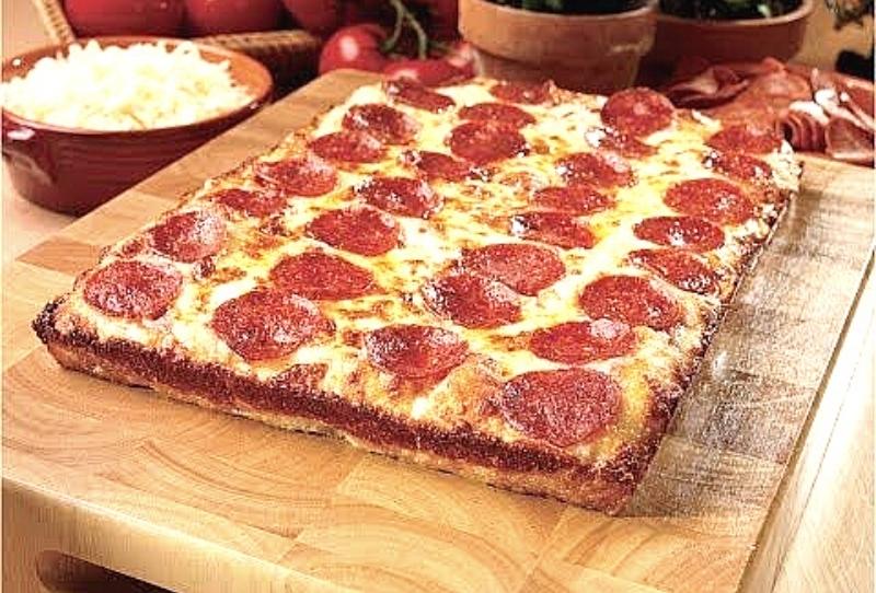 An assortment of delicious cheese and pepperoni pizzas from Ronzio's for parties at Kidz Kastle