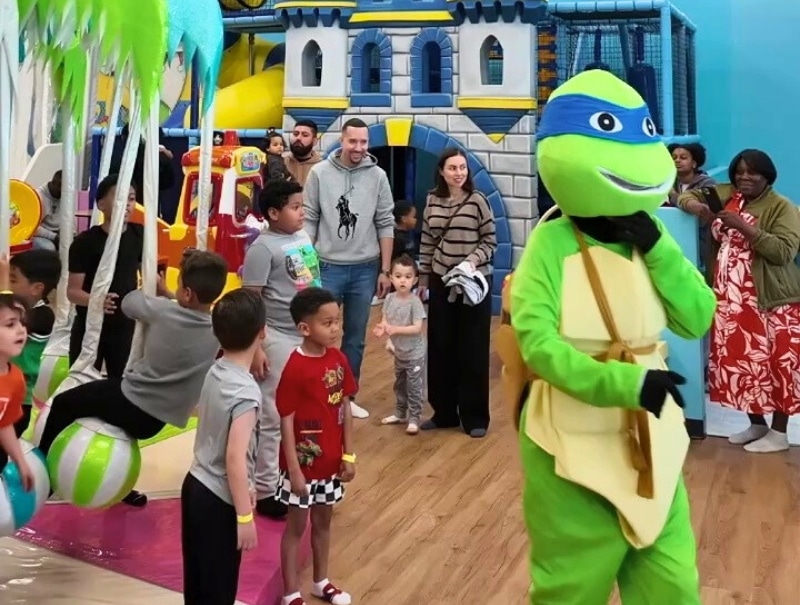 playdates with ninja turtle character near stage