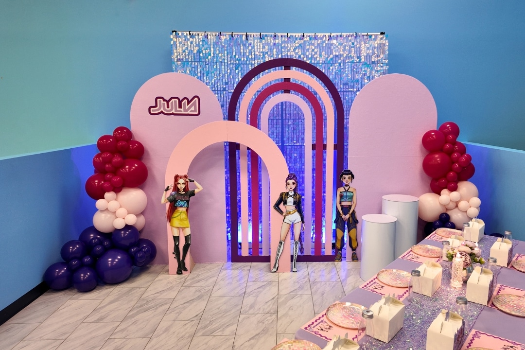 Custom K-Pop and Demon Hunter themed kids birthday party with shimmer backdrop at Kidz Kastle RI