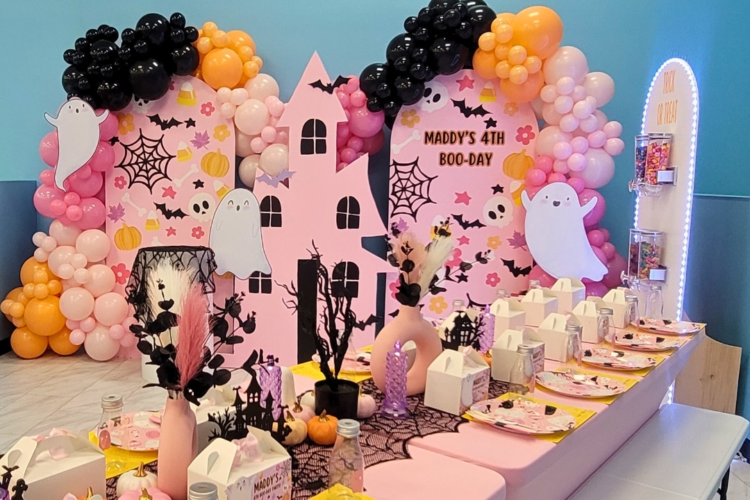 Pink Halloween Boo Day themed birthday party with ghosts haunted house and candy station at Kidz Kastle RI